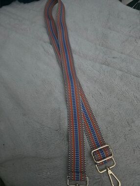 Adjustable Multi Colored Strap. Never Used
